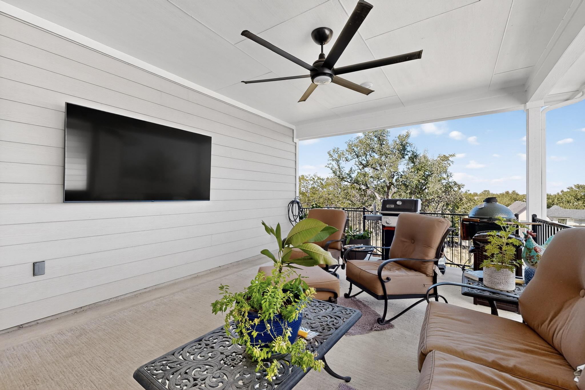473 Bauer Loop Liberty Hill, TX 78642 - Photo 33 of 38 View of patio featuring a ceiling fan, area for grilling, and outdoor lounge area