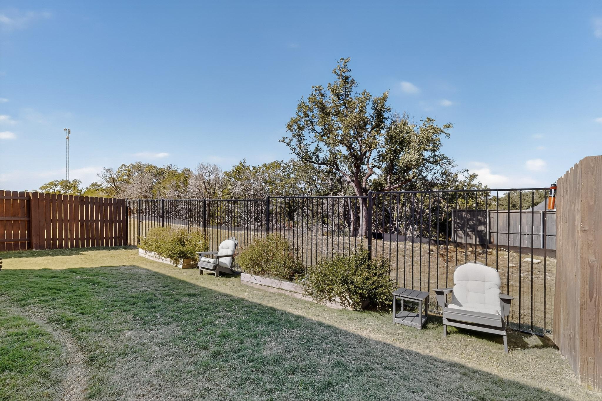 473 Bauer Loop Liberty Hill, TX 78642 - Photo 36 of 38 View of fenced backyard