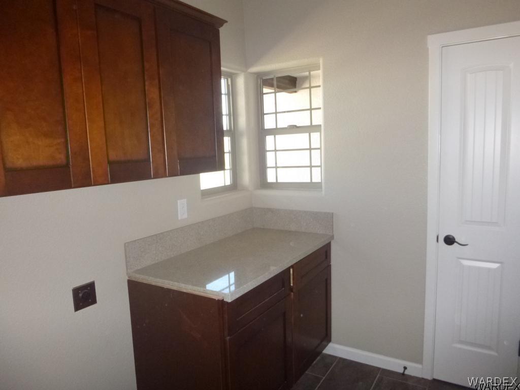 2673 Pegasus Ranch Road Bullhead City, AZ 86429 - Photo 32 of 36 LaundryRm Extra Storage Closet