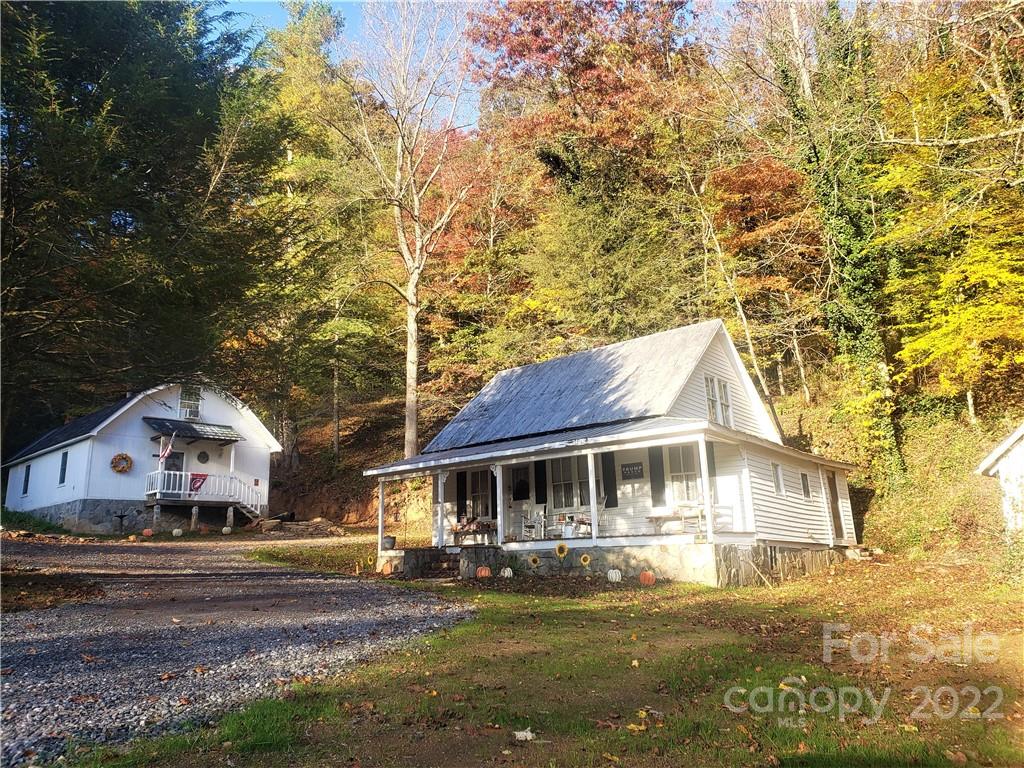a front view of a house with swimming pool