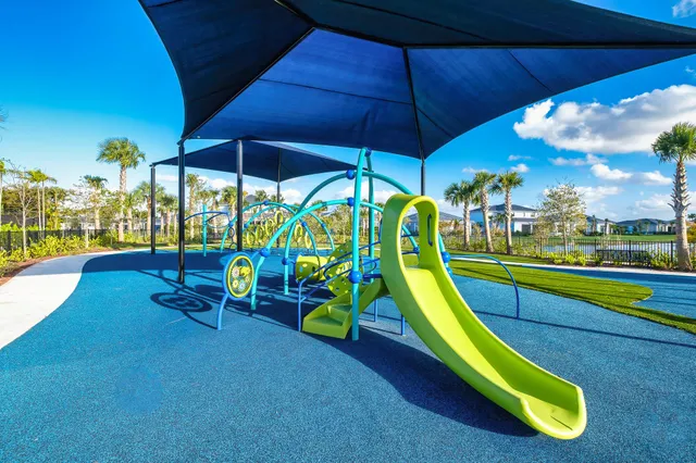 a view of a park with a slide