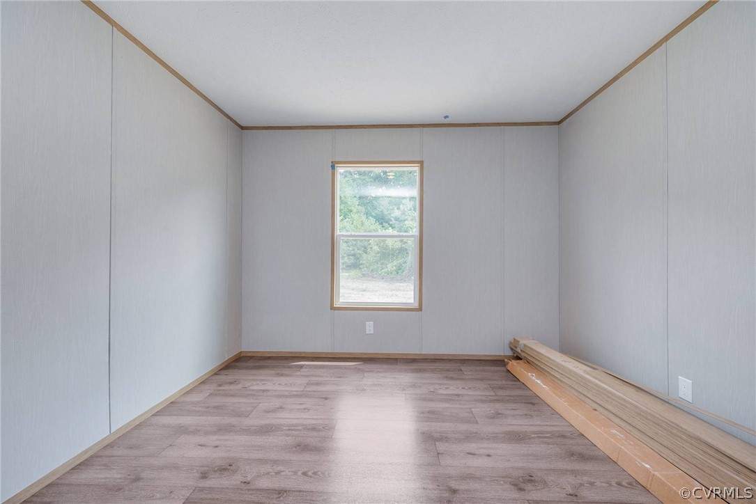 488 Chopping Road Mineral, VA 23117 - Photo 13 of 23 wooden floor in an empty room with a window