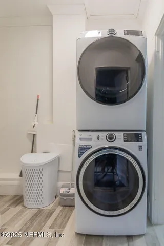 a utility room with a sink dryer and washer