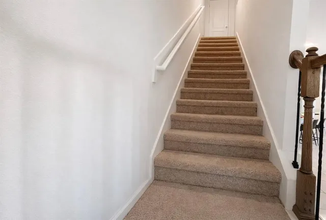 a bathroom with a sink toilet and a mirror