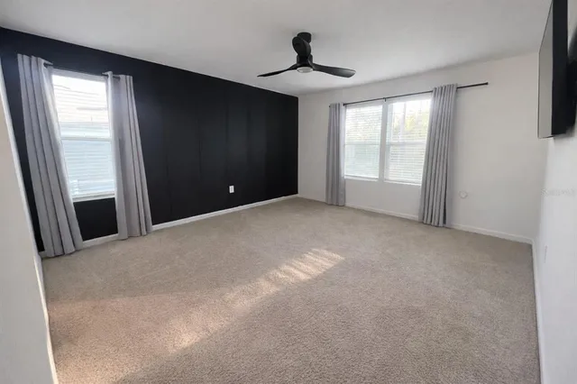 a view of a livingroom with a flat screen tv