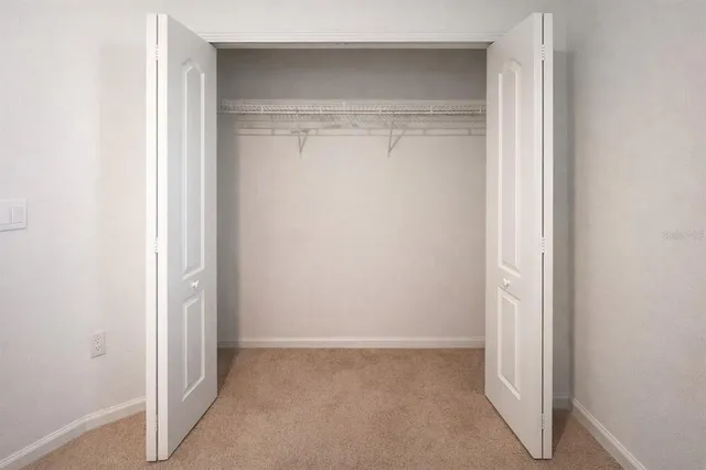 a bathroom with a toilet and a bathtub