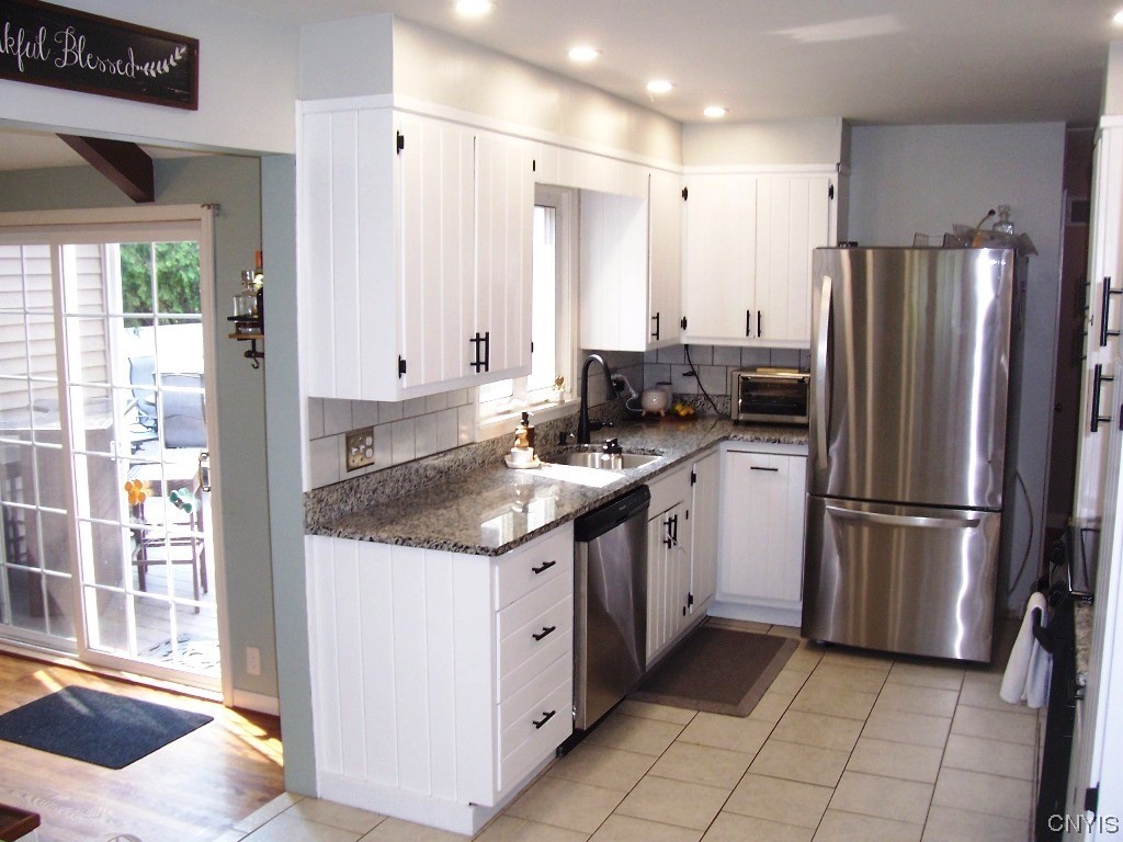 1705 North Madison Street Rome, NY 13440 - Photo 8 of 35 Kitchen With Woodmode Cabinetry, Ceramic Floor, St
