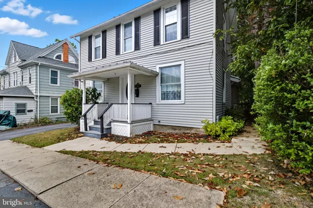 a front view of a house with a porch