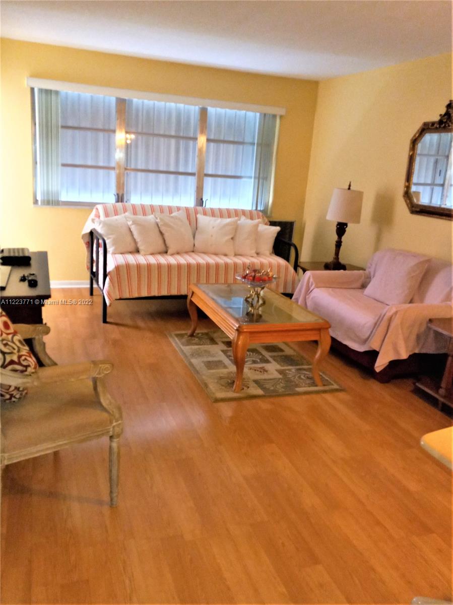 a bedroom with bed and window