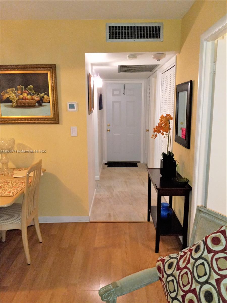 2223 Park Lane, Unit 211 Hollywood, FL 33021 - Photo 3 of 21 a living room with furniture