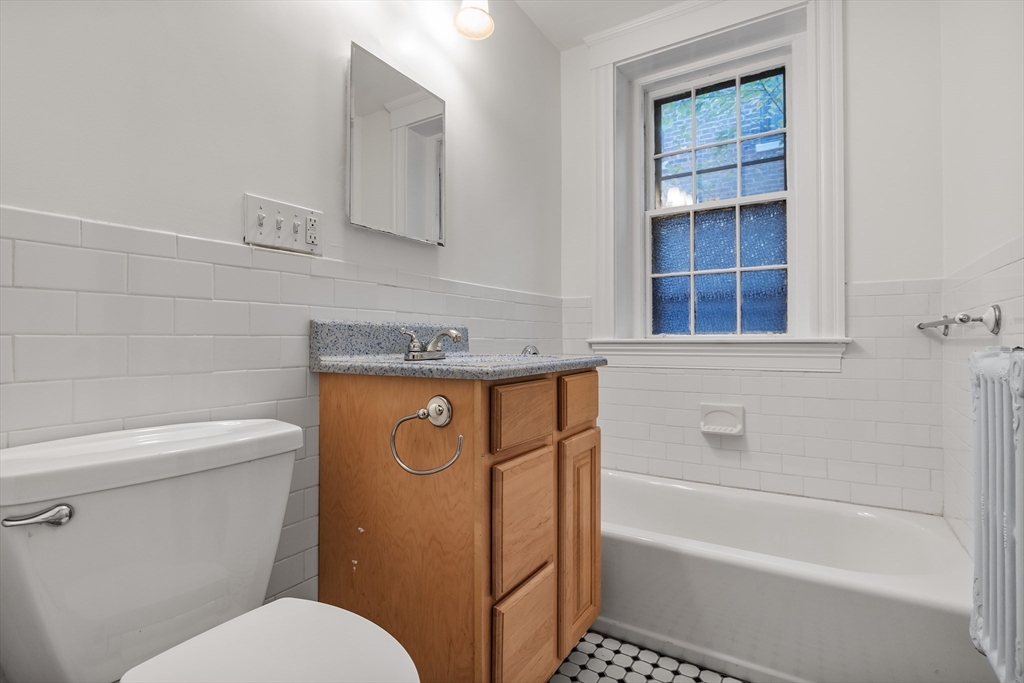 15-17 James Street, Unit 2 Brookline, MA 02446 - Photo 25 of 28 a bathroom with a sink toilet and bathtub