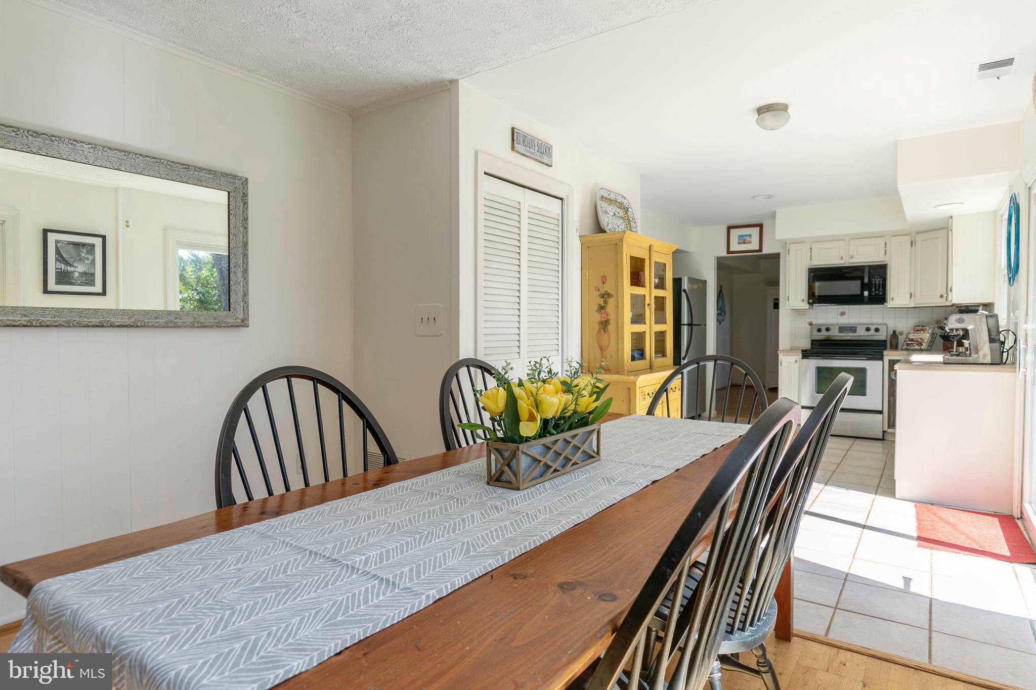 108 Rutledge Road Queenstown, MD 21658 - Photo 19 of 37 Nice table space between Kitchen and Family Room