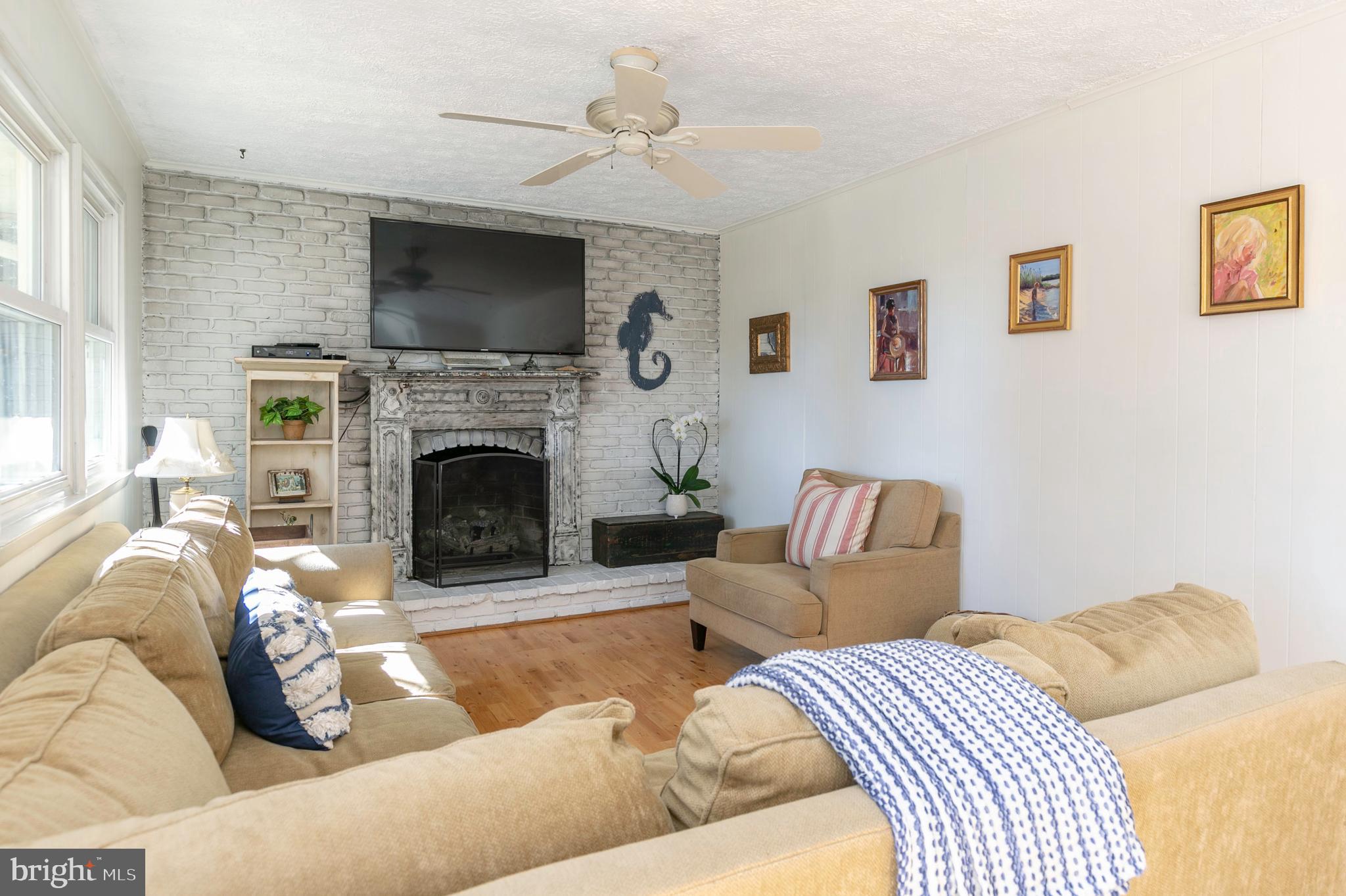 108 Rutledge Road Queenstown, MD 21658 - Photo 21 of 37 Family Room w/ Gas Fireplace. Mounted TV conveys