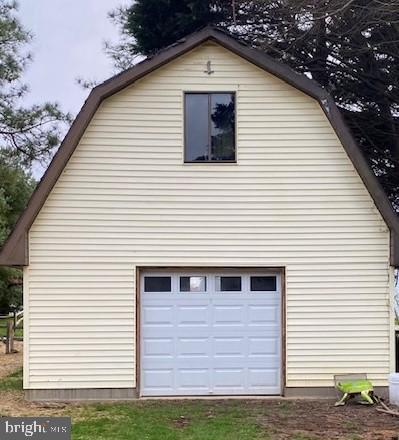 108 Rutledge Road Queenstown, MD 21658 - Photo 35 of 37 Two Level Garage/Workshop/Storage w/new garage doo