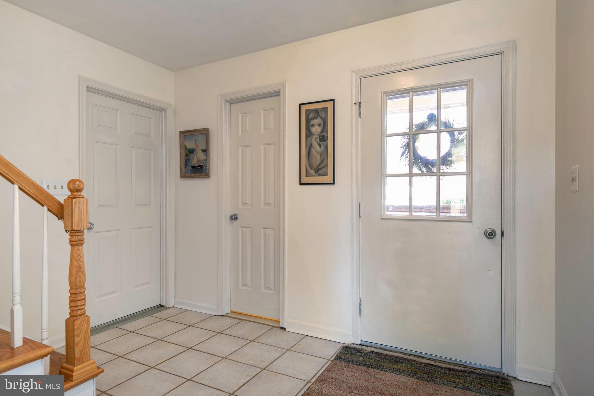 Front door adds light w/ additional storm door too