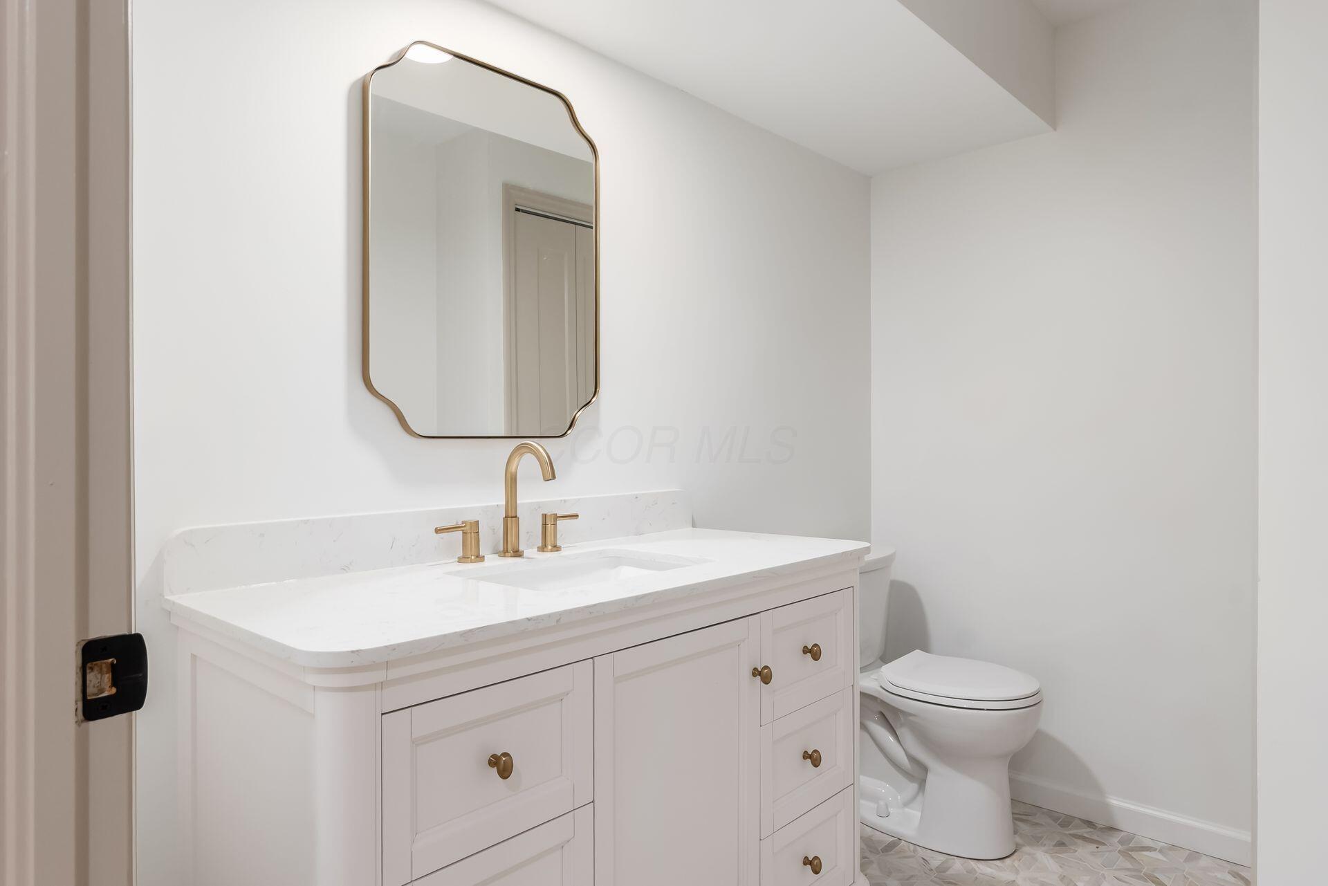 8458 Invergordon Court Dublin, OH 43017 - Photo 66 of 71 Renovated basement bath with refined finishes