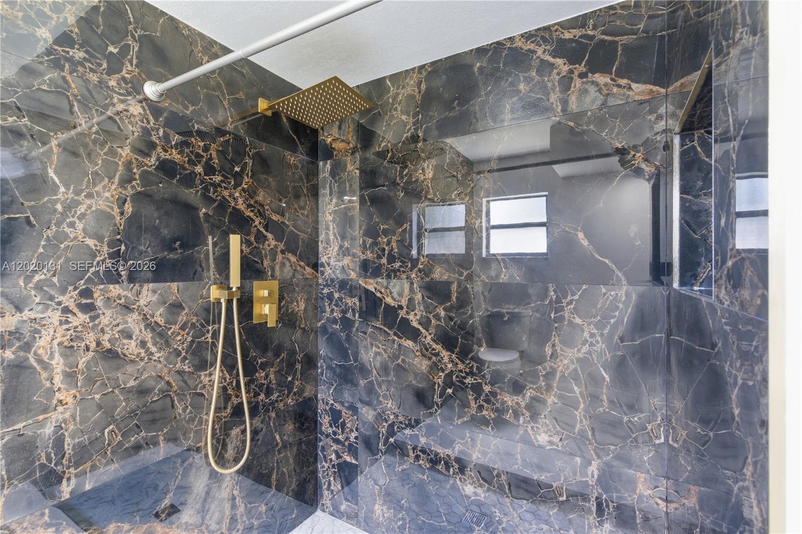 13408 Whitby Road Hudson, FL 34667 - Photo 11 of 30 a bathroom with a shower