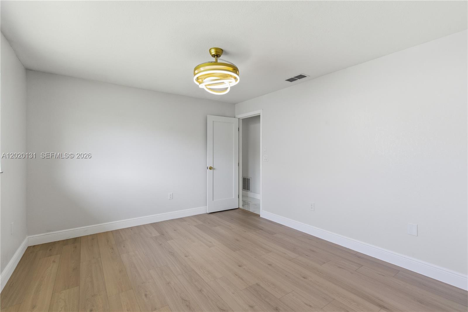 13408 Whitby Road Hudson, FL 34667 - Photo 17 of 30 a view of an empty room with a window