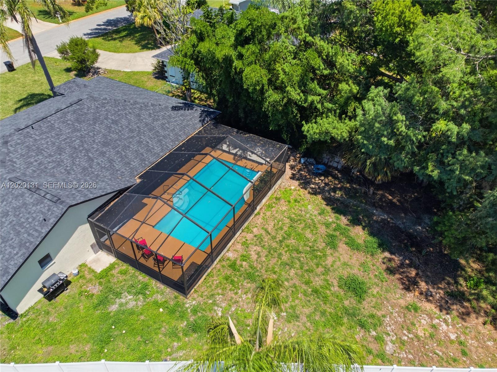 13408 Whitby Road Hudson, FL 34667 - Photo 28 of 30 a view of a backyard with swimming pool