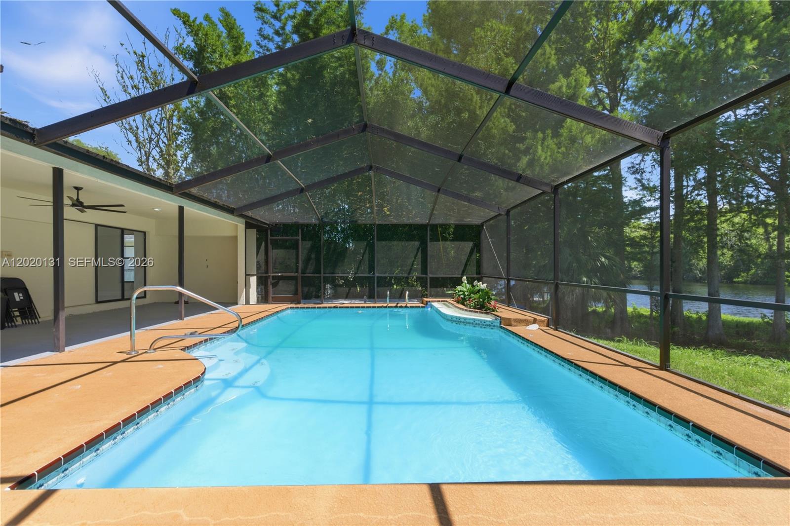13408 Whitby Road Hudson, FL 34667 - Photo 5 of 30 a view of swimming pool with seating area