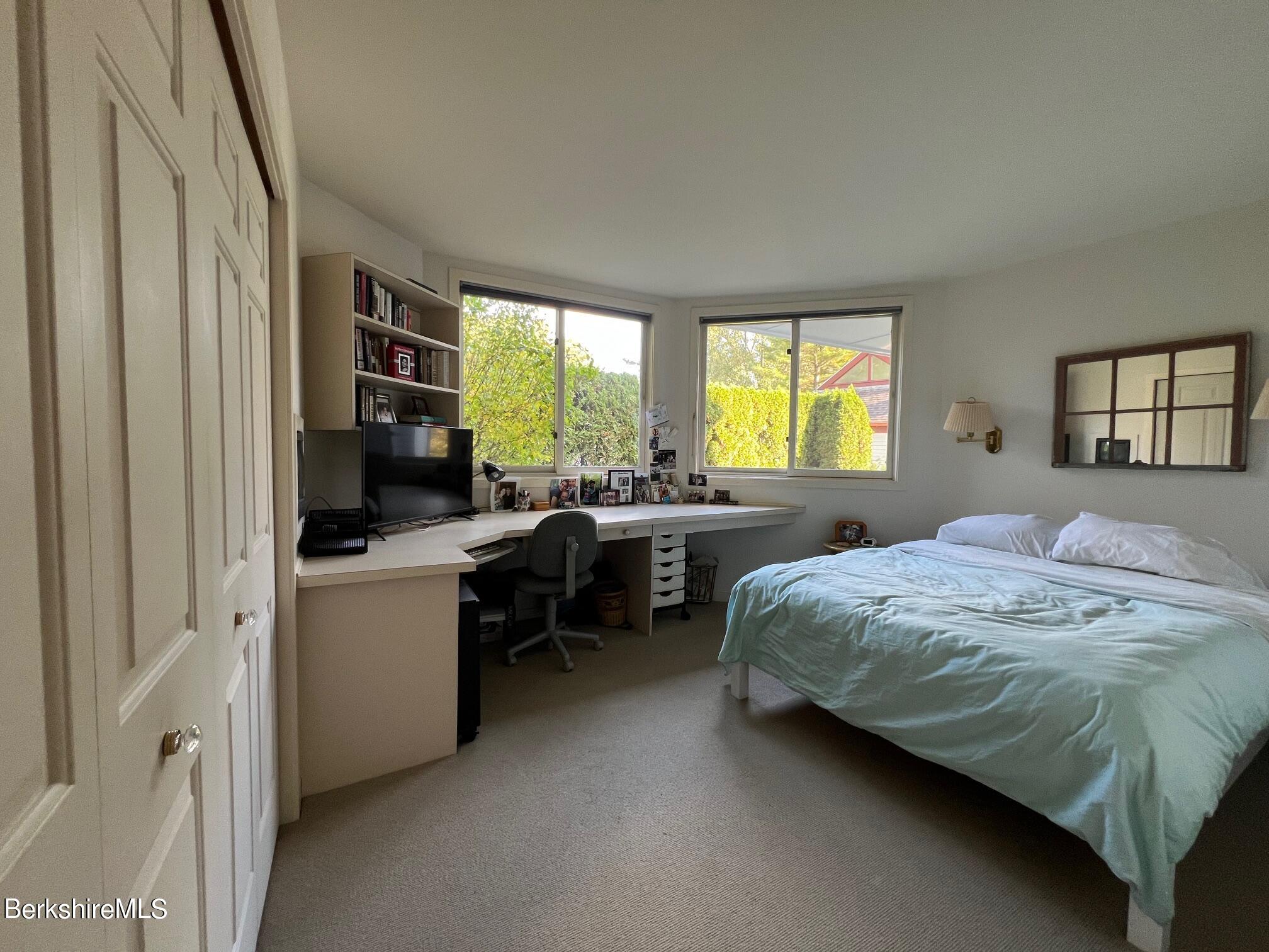 19 Hawthorne Road, Unit S2C Stockbridge, MA 01262 - Photo 31 of 41 a bedroom with a bed and a large window
