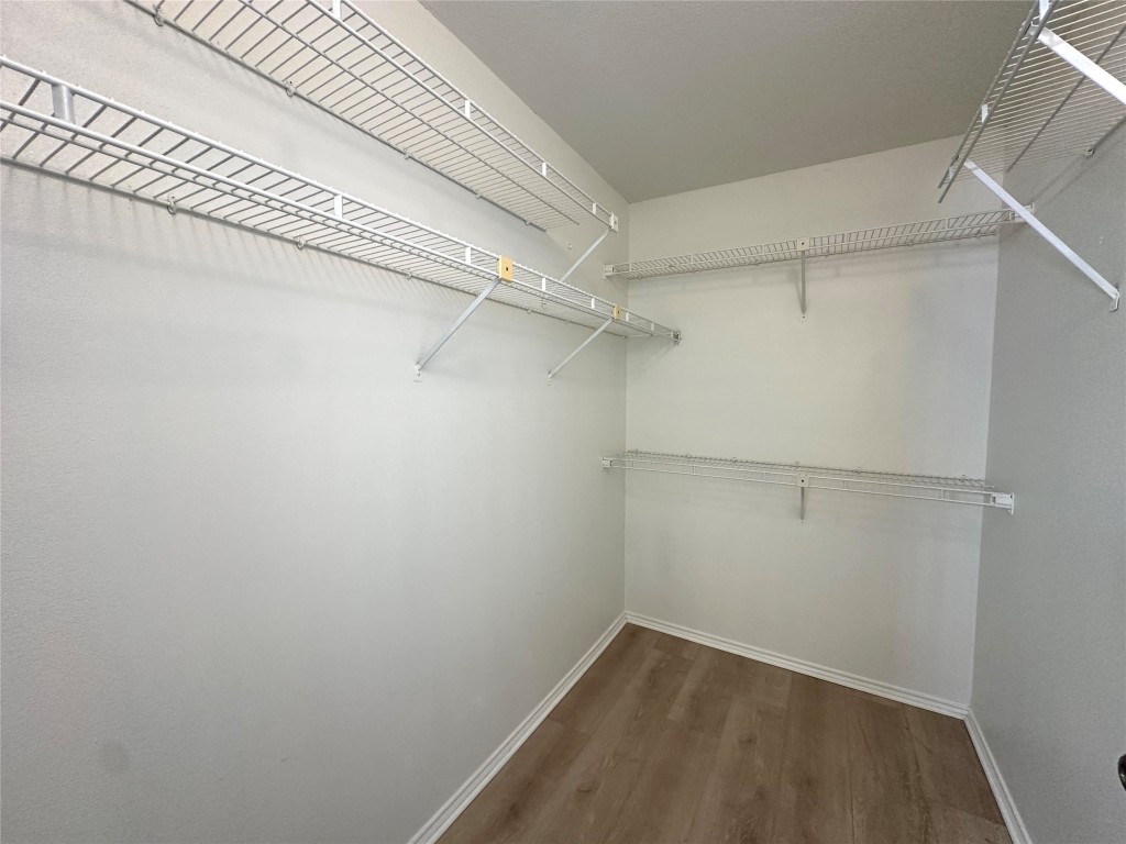 2105 Cervin Boulevard Austin, TX 78728 - Photo 11 of 22 a view of a room with racks on the wall