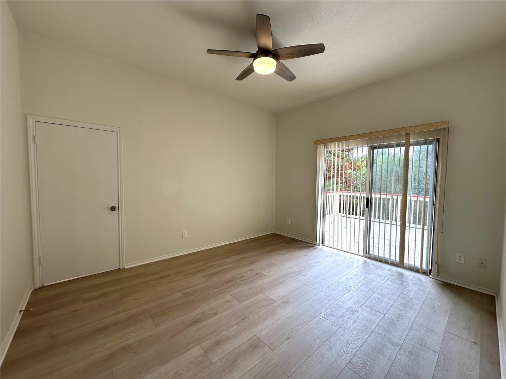 2105 Cervin Boulevard Austin, TX 78728 - Photo 10 of 22 a view of an empty room with a window