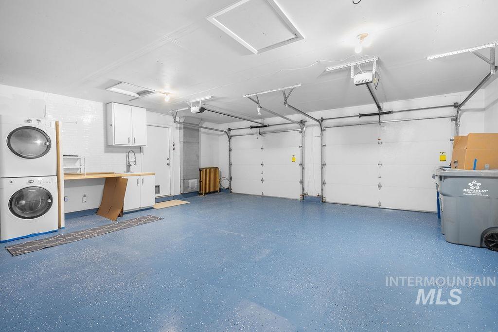 1561 Lenz Lane Boise, ID 83712 - Photo 22 of 29 Garage with stacked washing machine and dryer