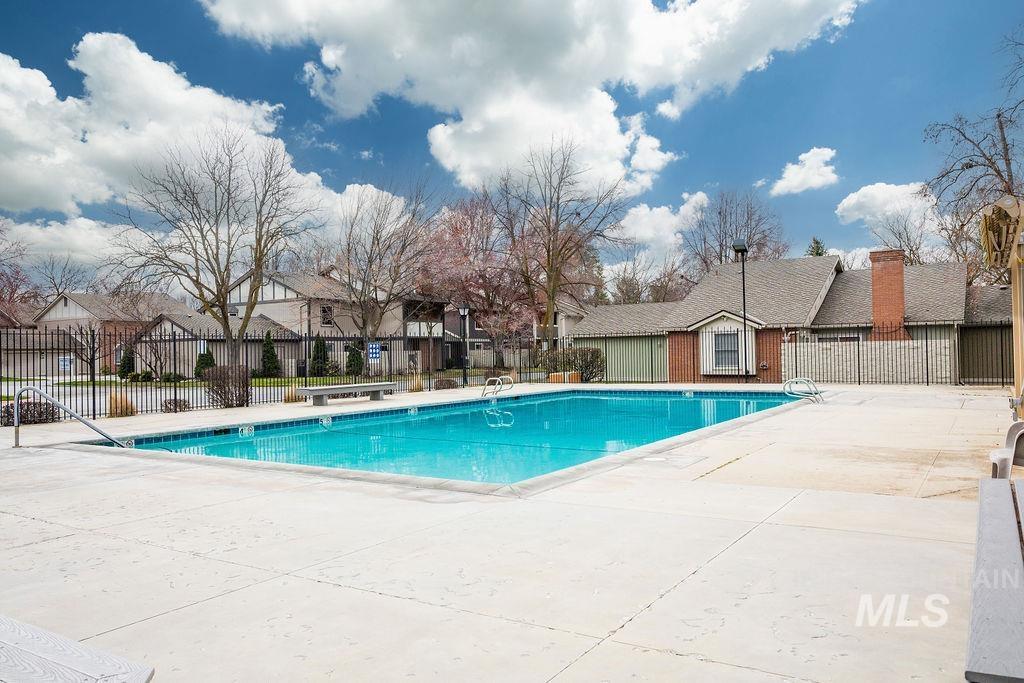 1561 Lenz Lane Boise, ID 83712 - Photo 25 of 29 Community pool featuring a patio and a residential view