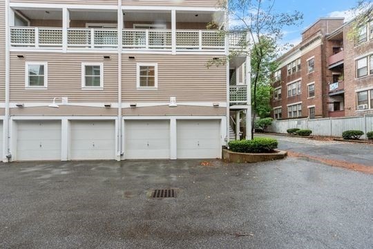28 Alton Place, Unit A Brookline, MA 02446 - Photo 22 of 23 a view of a building with a street