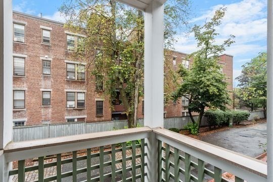 28 Alton Place, Unit A Brookline, MA 02446 - Photo 23 of 23 a view of a building from a balcony