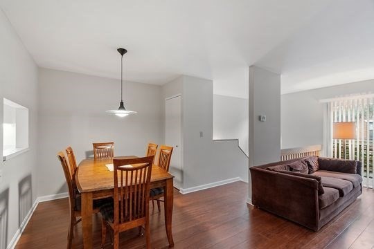 28 Alton Place, Unit A Brookline, MA 02446 - Photo 10 of 23 a living room with furniture and wooden floor