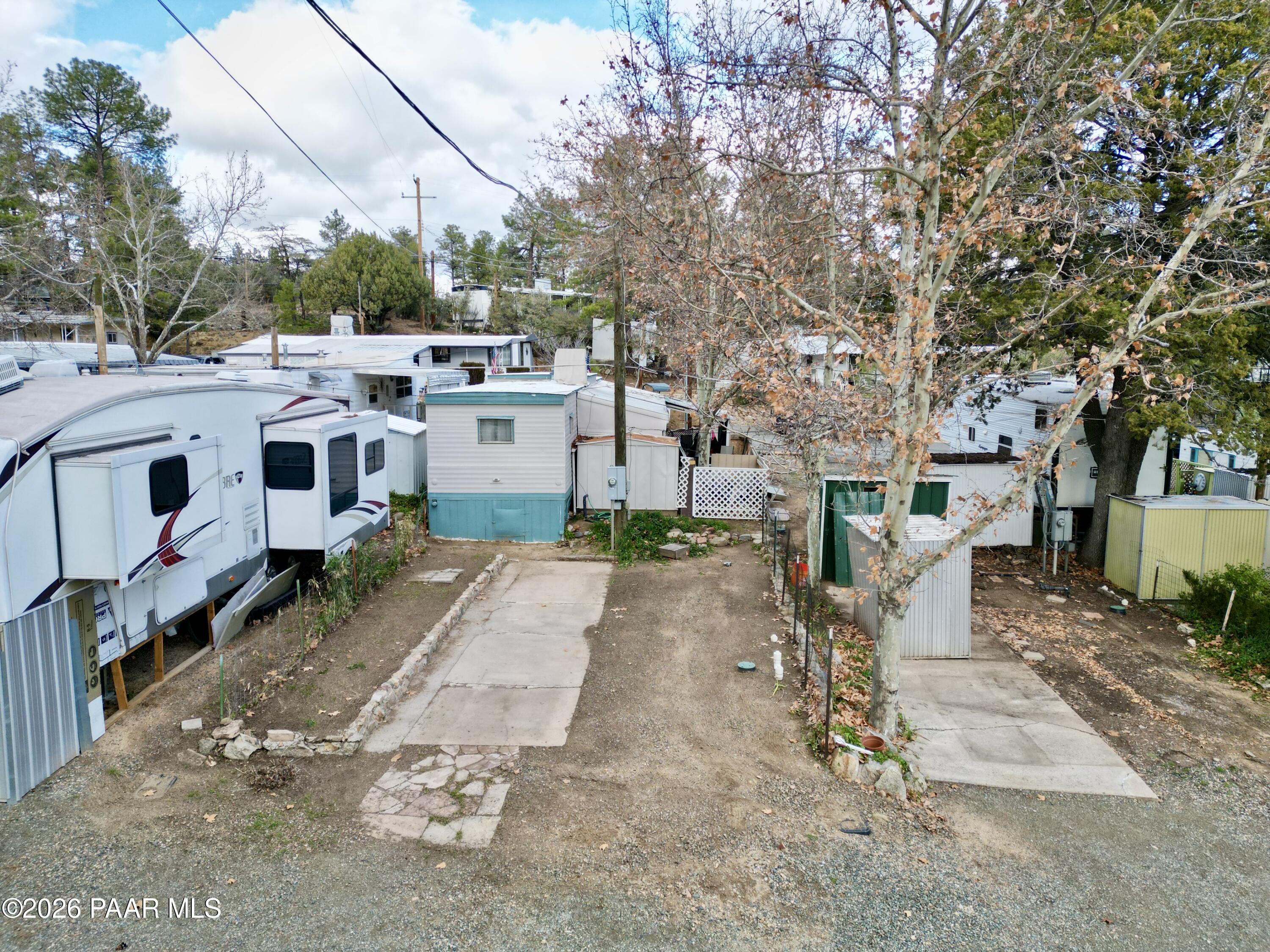 700 White Spar Road Prescott, AZ 86303 - Photo 22 of 87 a view of a house with a yard and sitting area