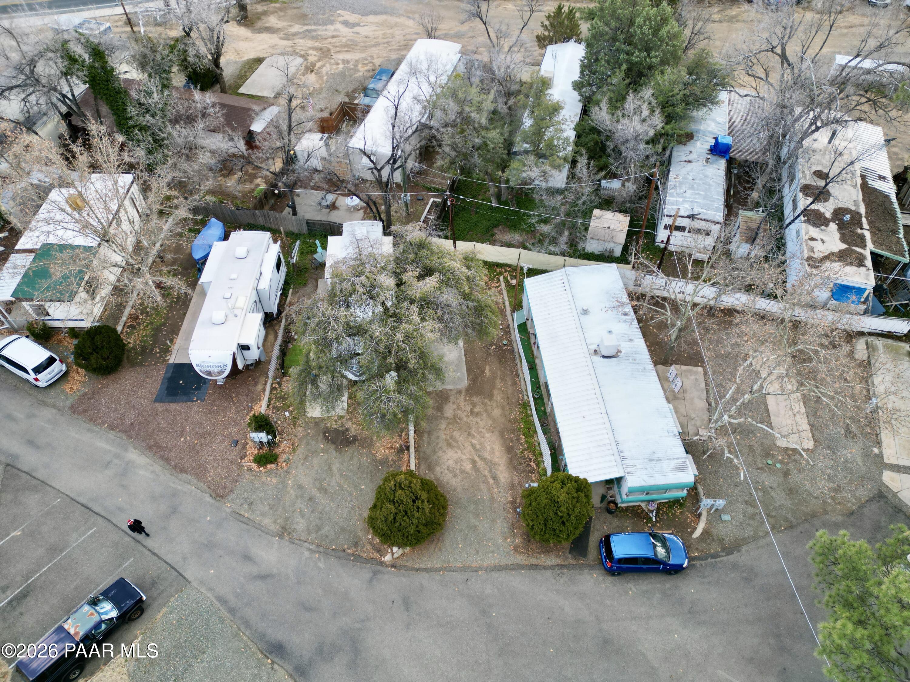 700 White Spar Road Prescott, AZ 86303 - Photo 30 of 87 an aerial view of a yard with table and chairs