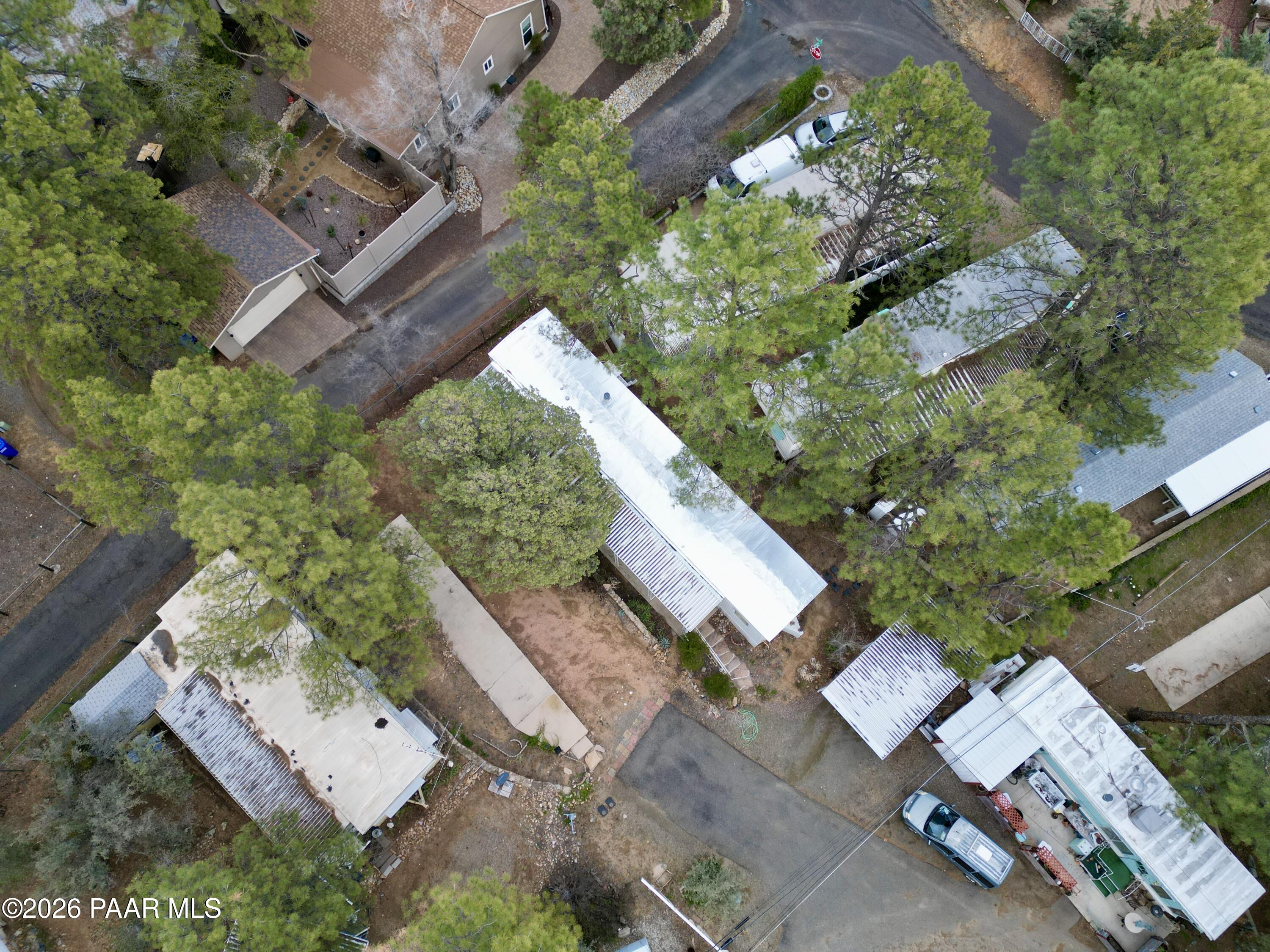 700 White Spar Road Prescott, AZ 86303 - Photo 36 of 87 an aerial view of a house with a yard and garden