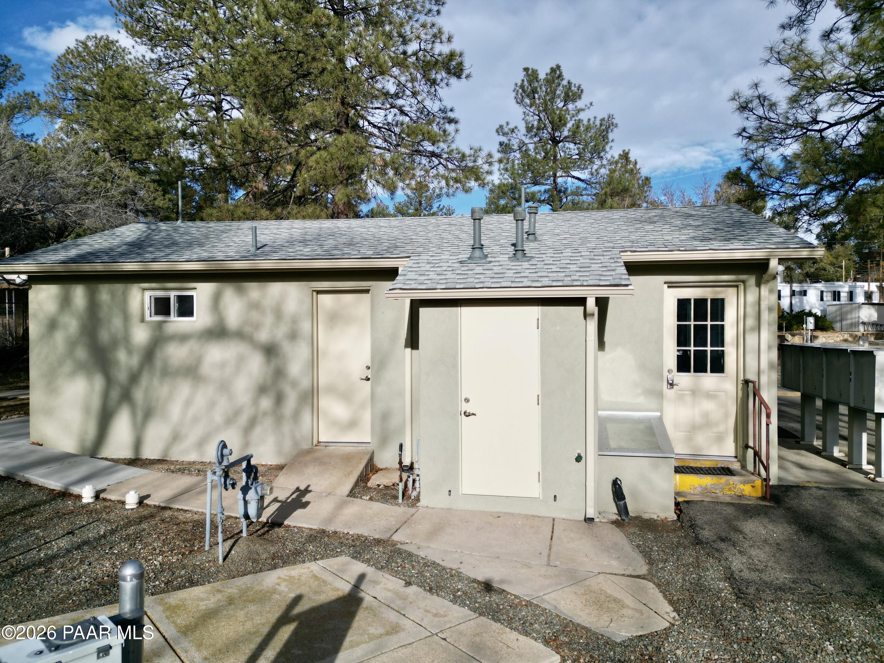 700 White Spar Road Prescott, AZ 86303 - Photo 51 of 87 a view of a house with backyard and sitting area
