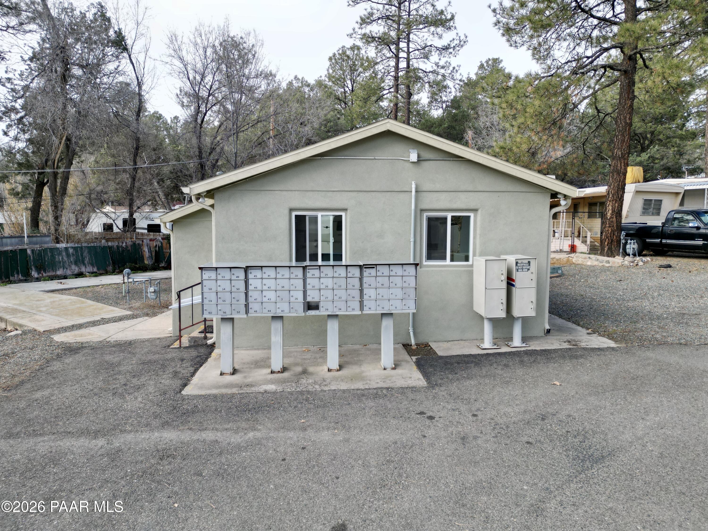 700 White Spar Road Prescott, AZ 86303 - Photo 58 of 87 a view of a house with a yard and large tree