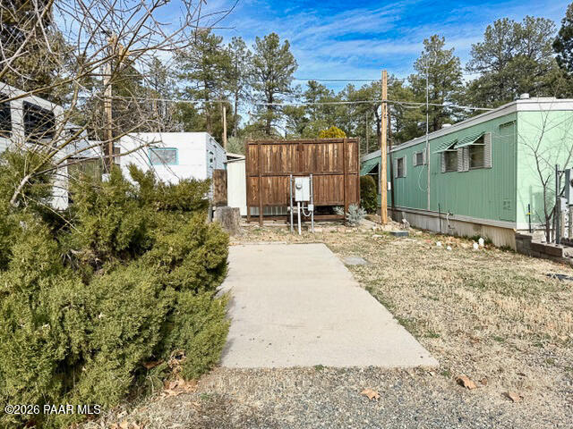 700 White Spar Road Prescott, AZ 86303 - Photo 85 of 87 a backyard of a house with table and chairs