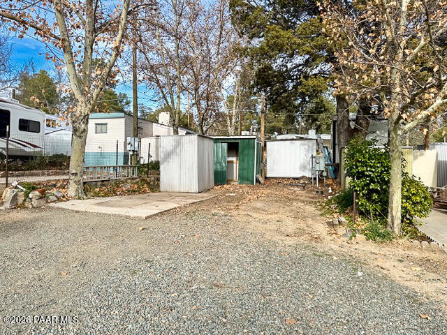 700 White Spar Road Prescott, AZ 86303 - Photo 86 of 87 a view of a backyard with large trees