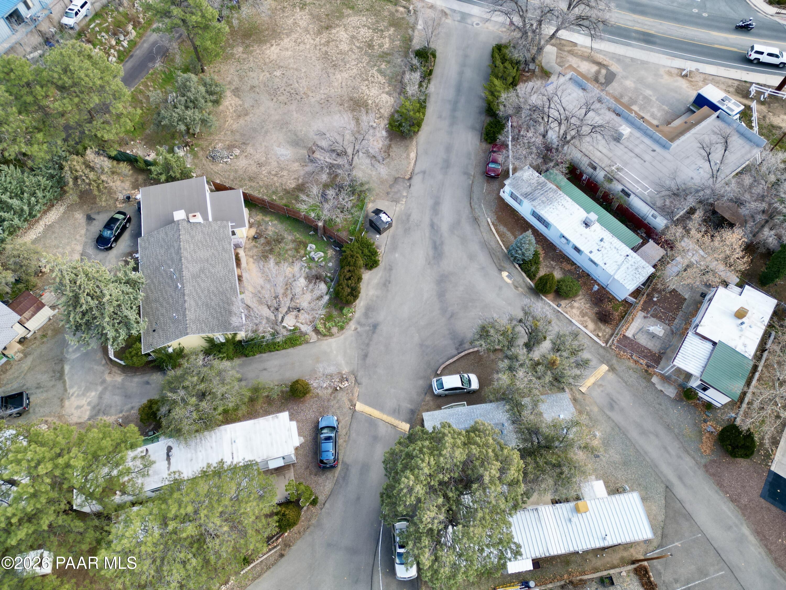 700 White Spar Road Prescott, AZ 86303 - Photo 10 of 87 an aerial view of a house with a yard and a large tree