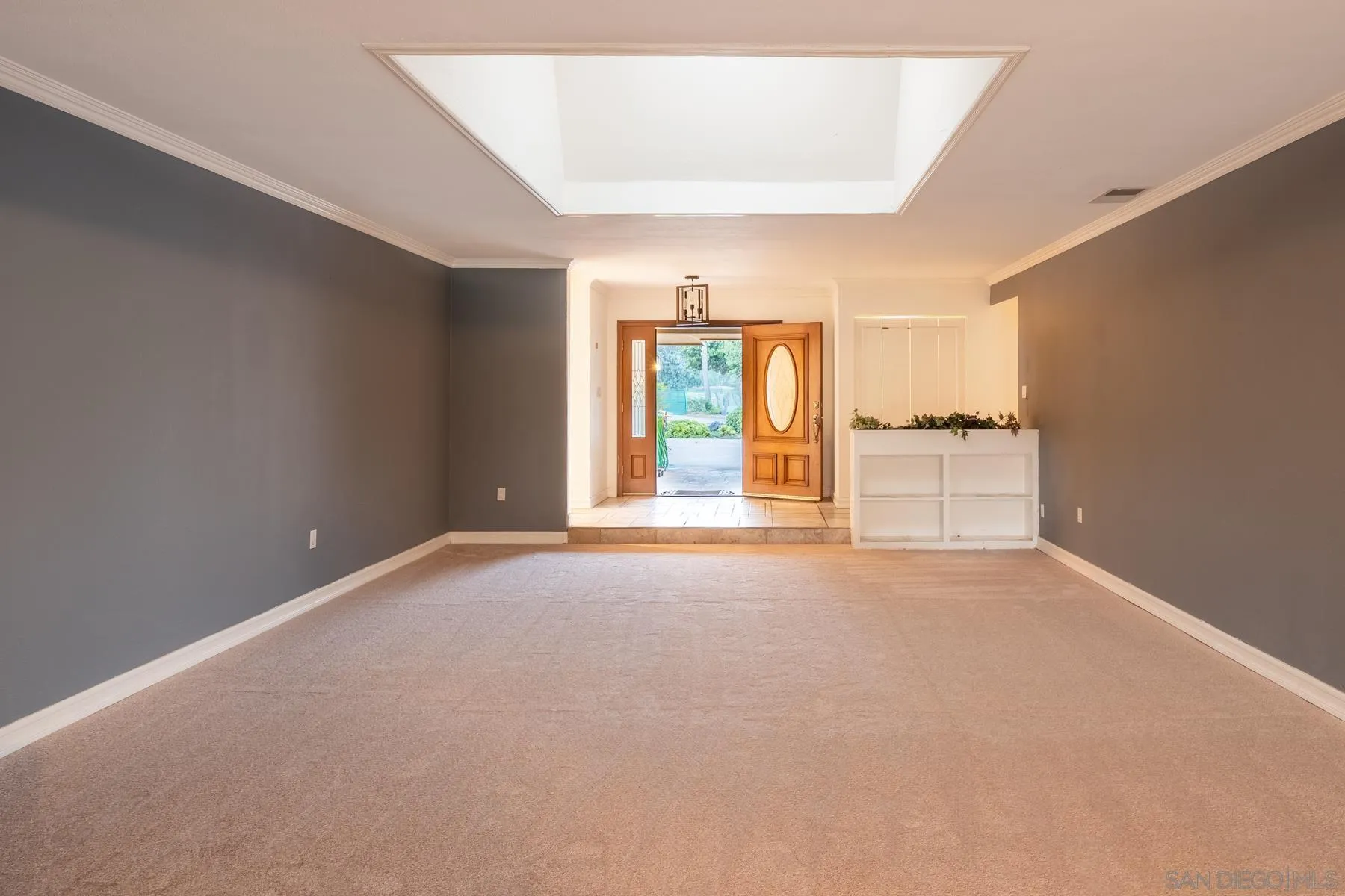 2015 Alga Road Carlsbad, CA 92009 - Photo 3 of 16 an empty room with windows and city view