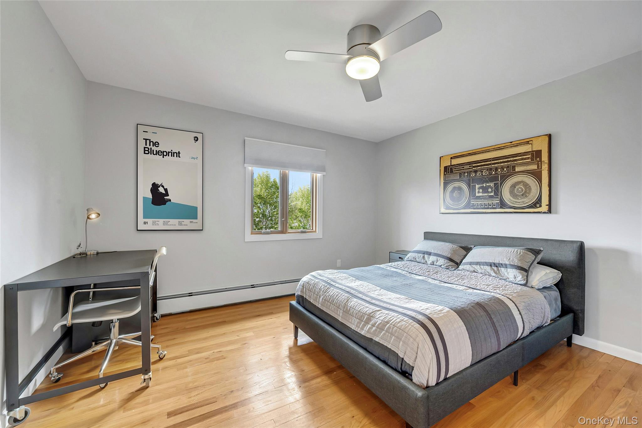 33 Hirst Road Briarcliff Manor, NY 10510 - Photo 12 of 25 a bedroom with a bed and a desk
