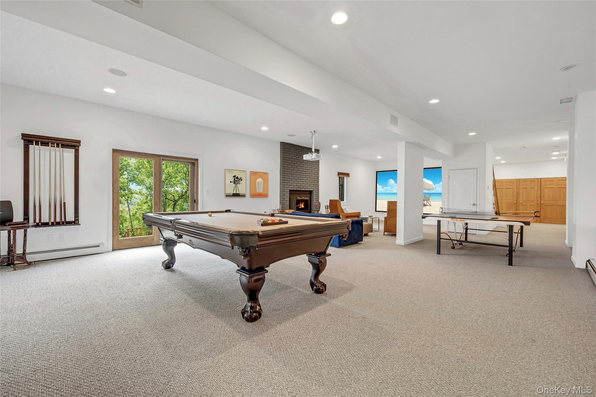 33 Hirst Road Briarcliff Manor, NY 10510 - Photo 17 of 25 a living room with furniture pool table and windows