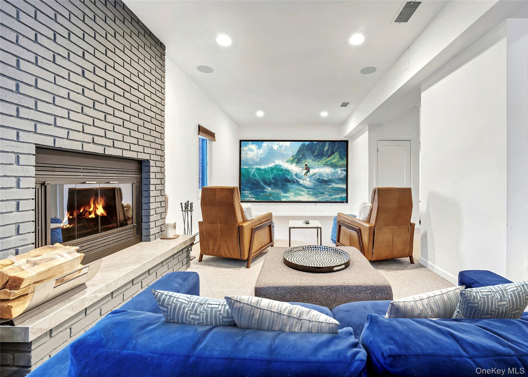 33 Hirst Road Briarcliff Manor, NY 10510 - Photo 18 of 25 a living room with furniture and a fireplace