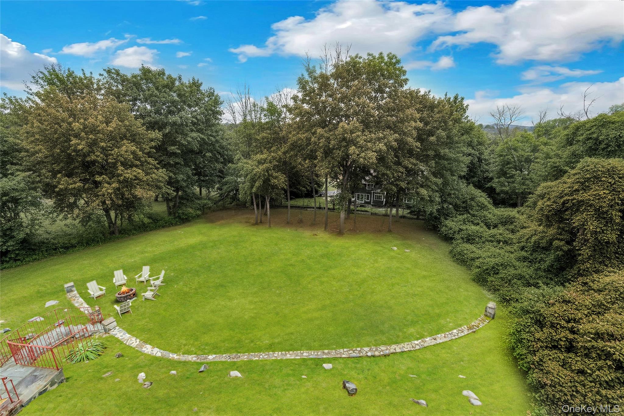33 Hirst Road Briarcliff Manor, NY 10510 - Photo 23 of 25 a view of a swimming pool with a yard