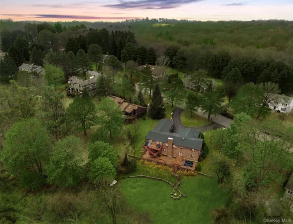 an aerial view of a house with a garden