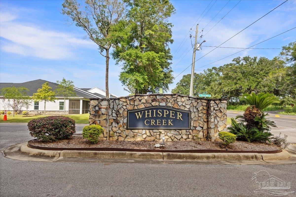 4666 Perception Circle Milton, FL 32570 - Photo 2 of 36 a sign on the side of a building