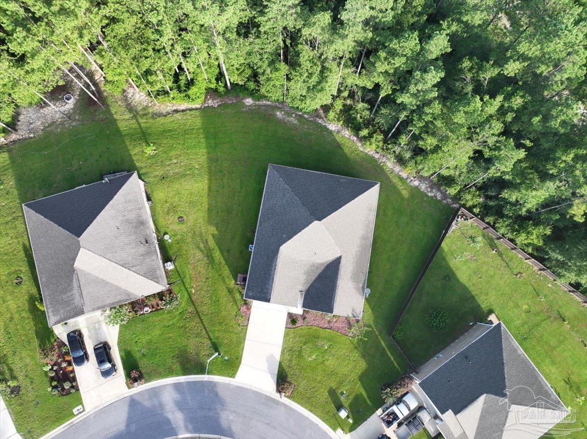 4666 Perception Circle Milton, FL 32570 - Photo 30 of 36 a view of a garden from a balcony