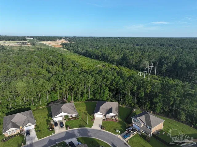 a view of a patio with furniture