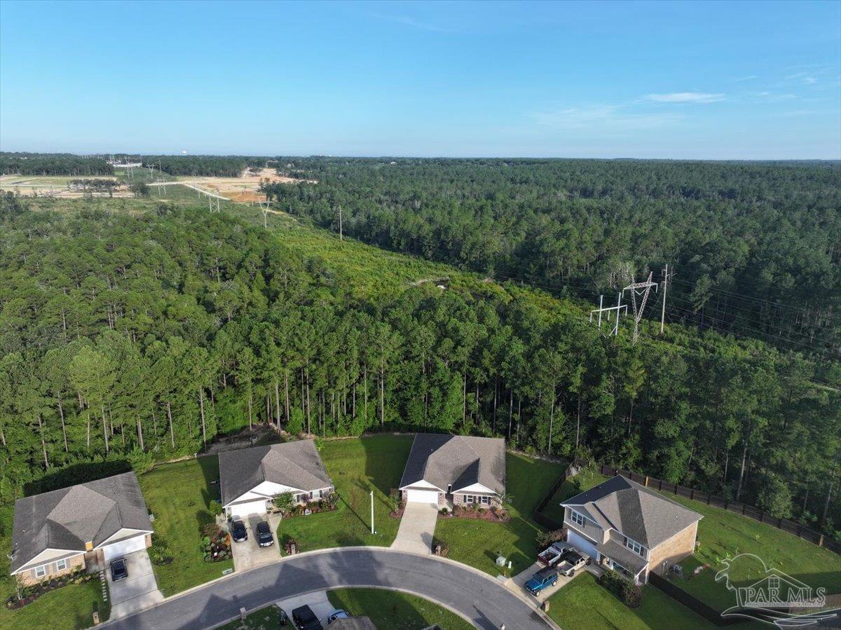 4666 Perception Circle Milton, FL 32570 - Photo 32 of 36 a view of a patio with furniture